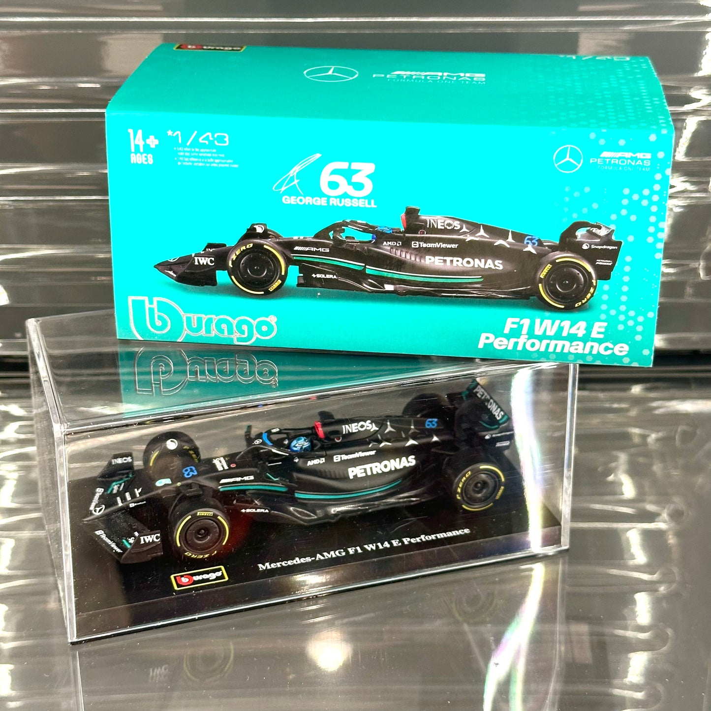 Bburago Mercedes-AMG Petronas W14 Performance (2023) with Driver's Helmet & Showcase 1:43