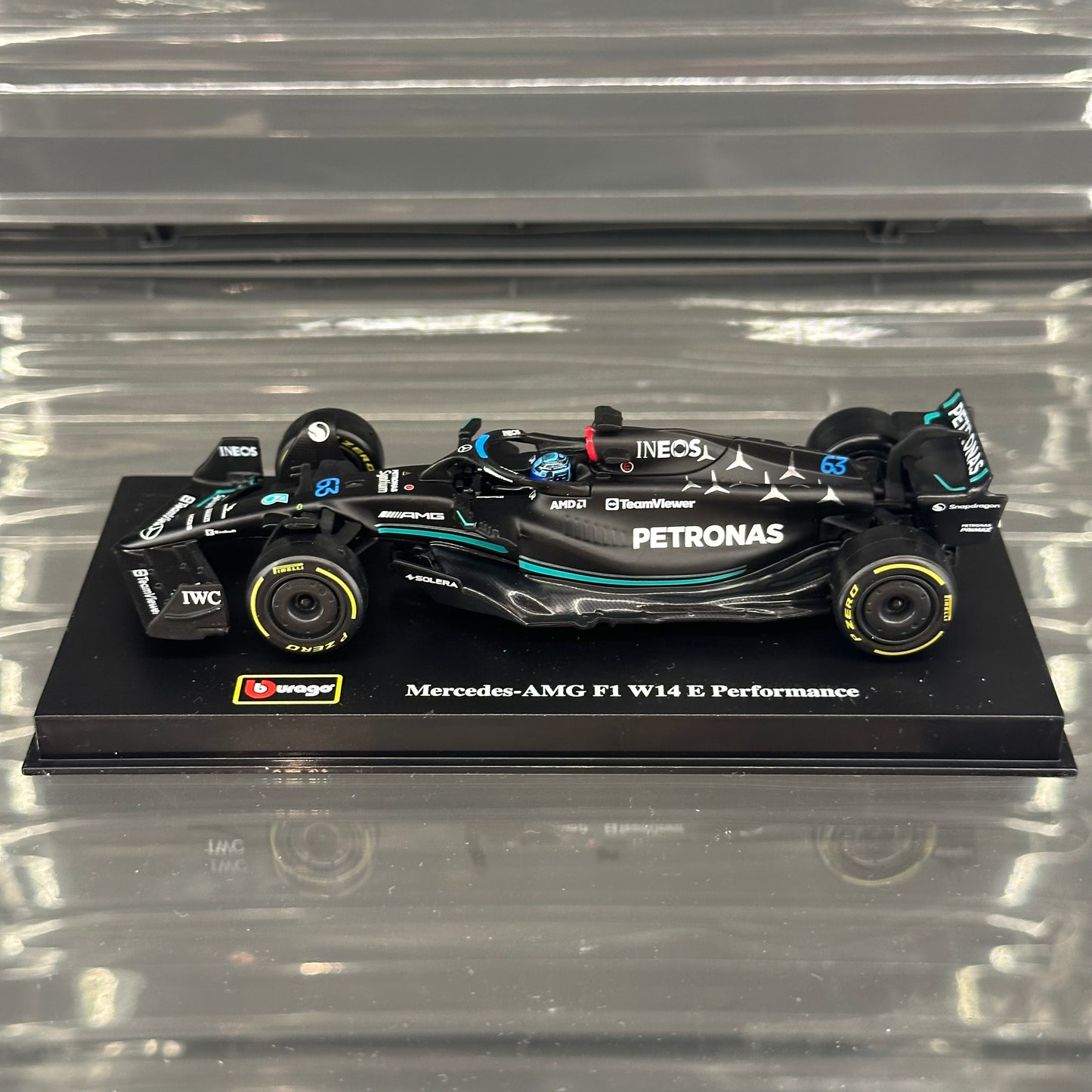 Bburago Mercedes-AMG Petronas W14 Performance (2023) with Driver's Helmet & Showcase 1:43