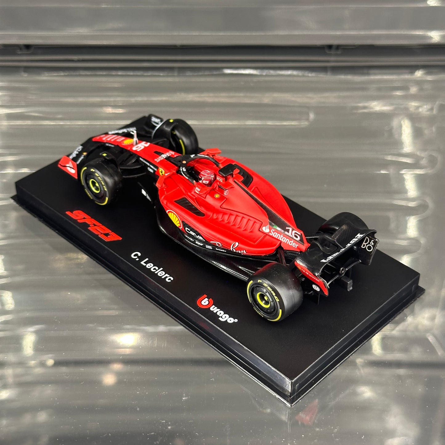 Bburago Scuderia Ferrari SF-23 (2023) with Driver's Helmet & Showcase 1:43