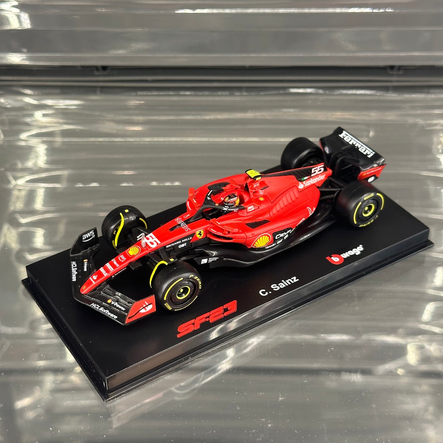 Bburago Scuderia Ferrari SF-23 (2023) with Driver's Helmet & Showcase 1:43