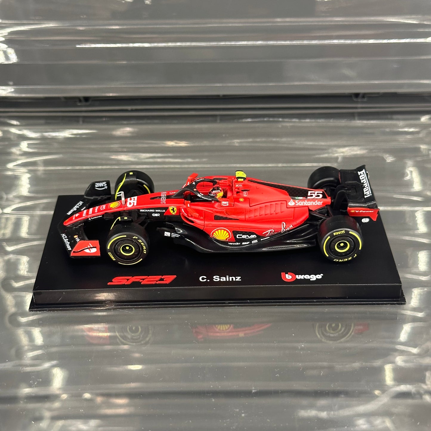 Bburago Scuderia Ferrari SF-23 (2023) with Driver's Helmet & Showcase 1:43
