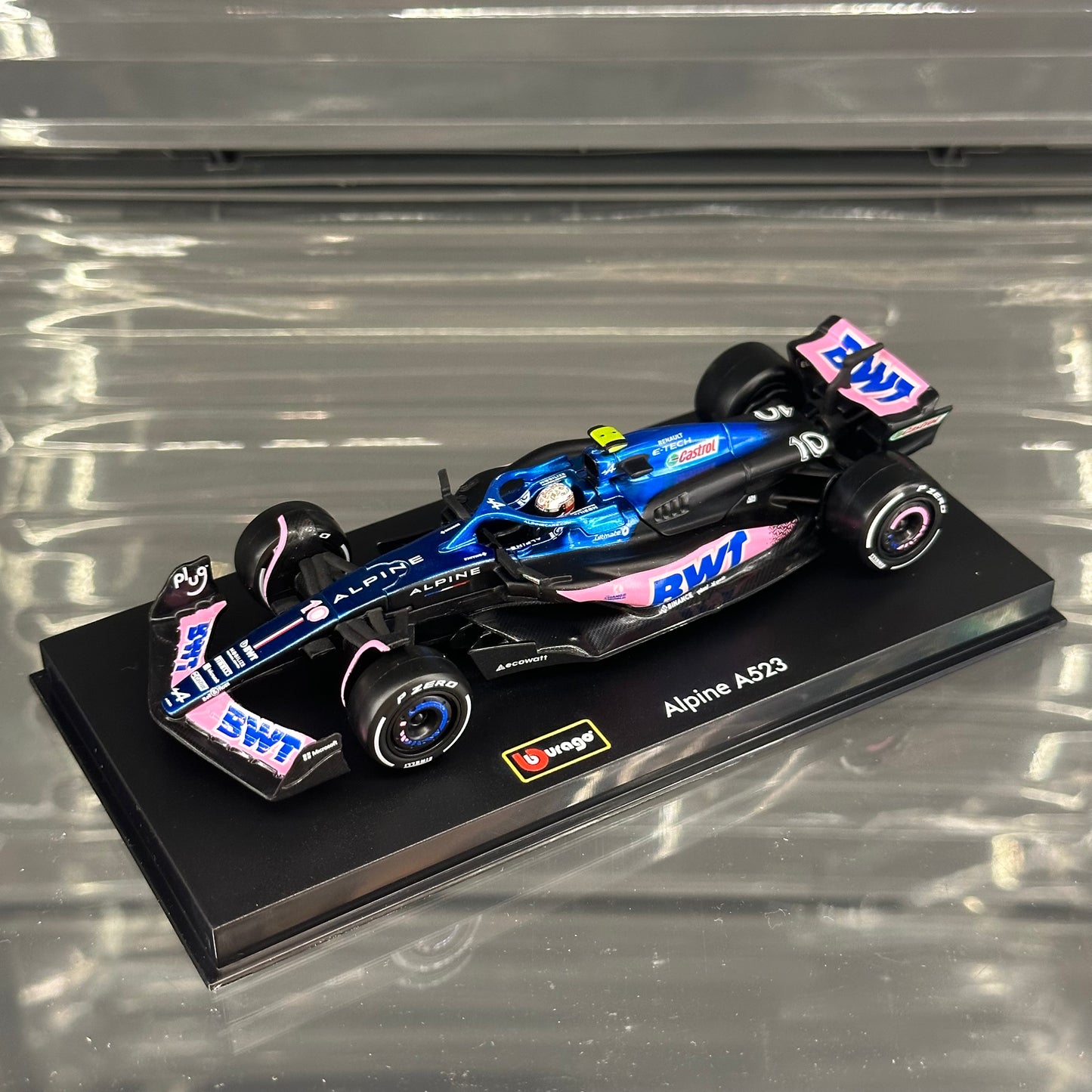 Bburago BWT Alpine F1 A523 (2023) Blue Livery with Driver's Helmet & Showcase 1:43
