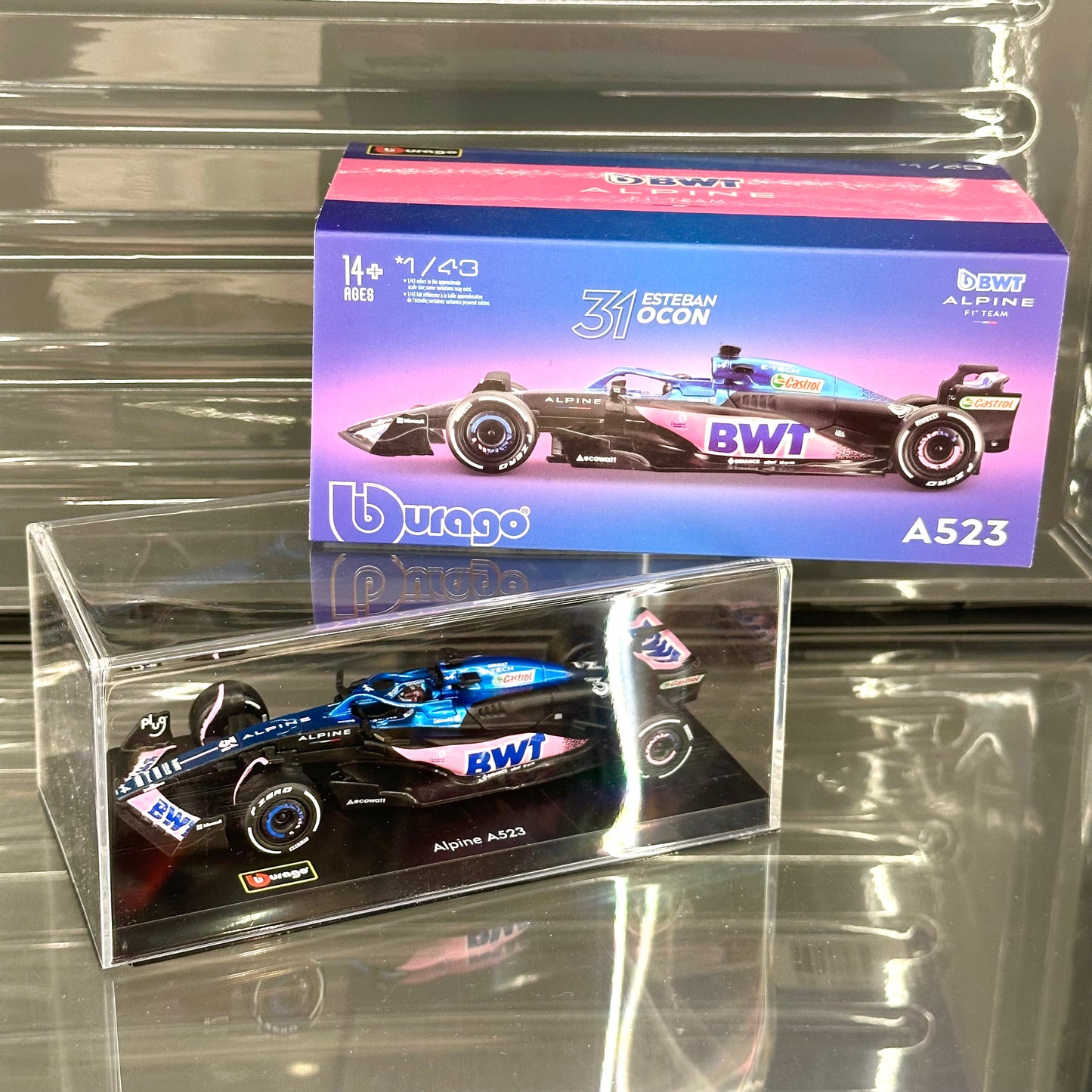 Bburago BWT Alpine F1 A523 (2023) Blue Livery with Driver's Helmet & Showcase 1:43