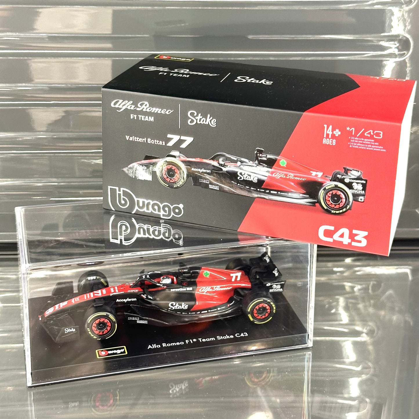 Bburago Alfa Romeo Stake F1 C43 (2023) with Driver's Helmet & Showcase 1:43
