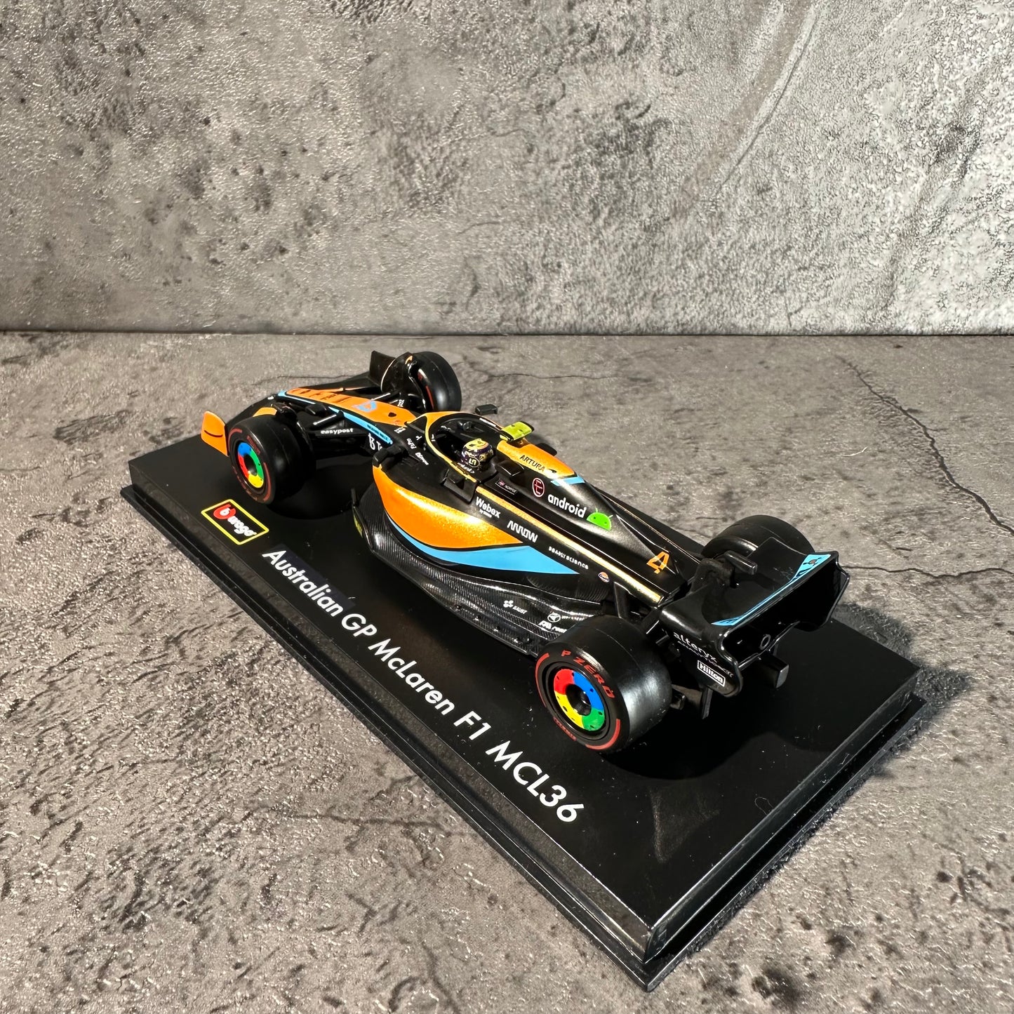 Bburago McLaren F1— MCL36 (2022) 1/43 with Driver's Helmet & Showcase