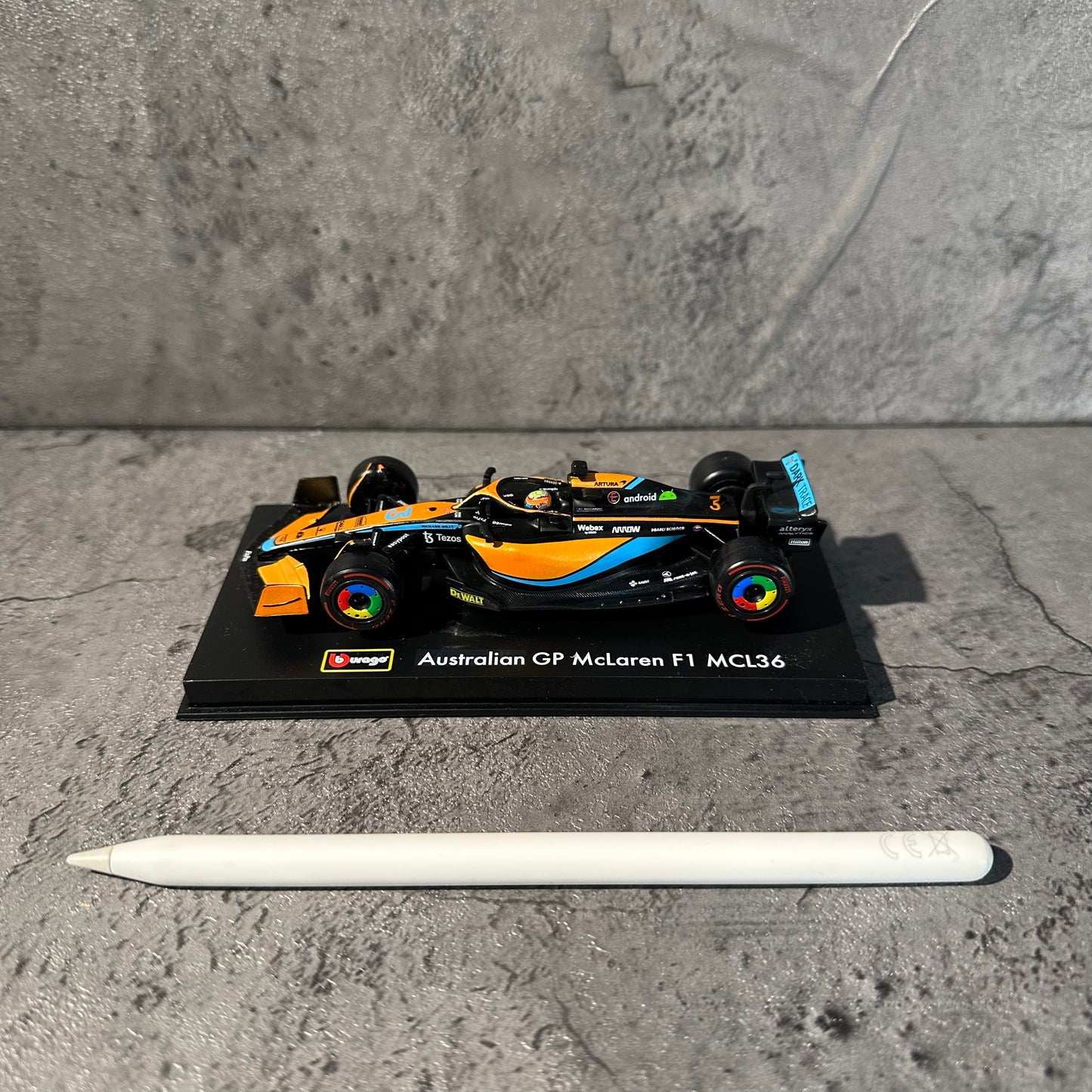 Bburago McLaren F1— MCL36 (2022) 1/43 with Driver's Helmet & Showcase