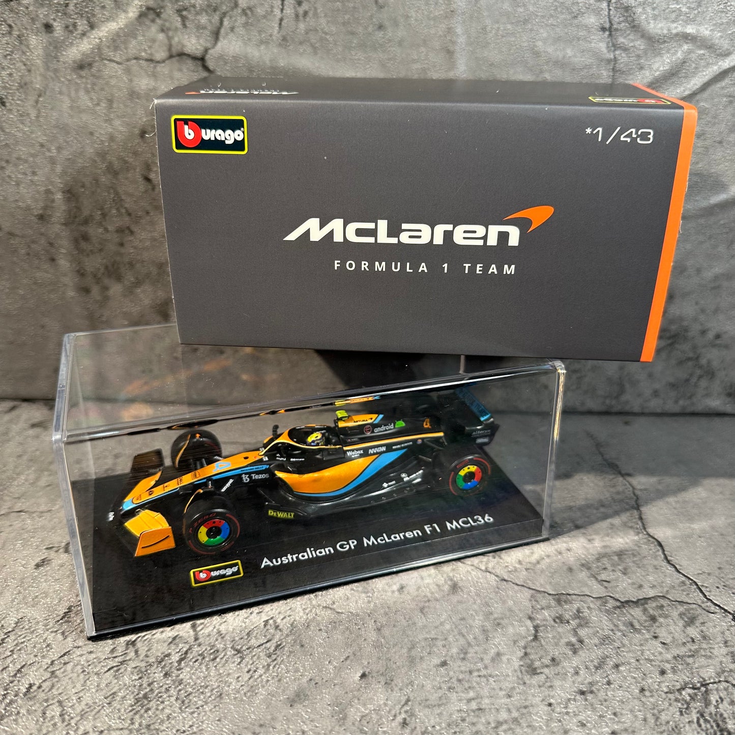 Bburago McLaren F1— MCL36 (2022) 1/43 with Driver's Helmet & Showcase