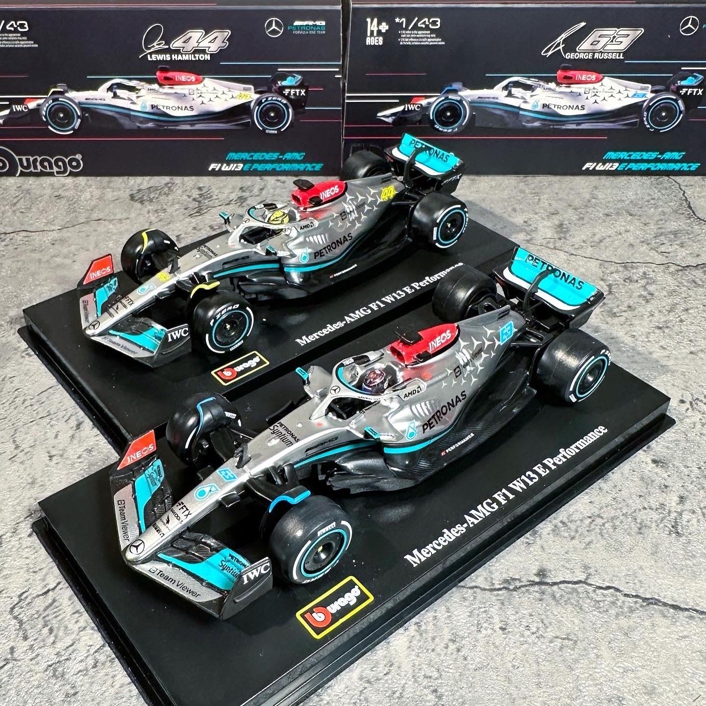Mercedes-AMG W13E Performance (2022) 1:43 with Driver’s Helmet & Showcase