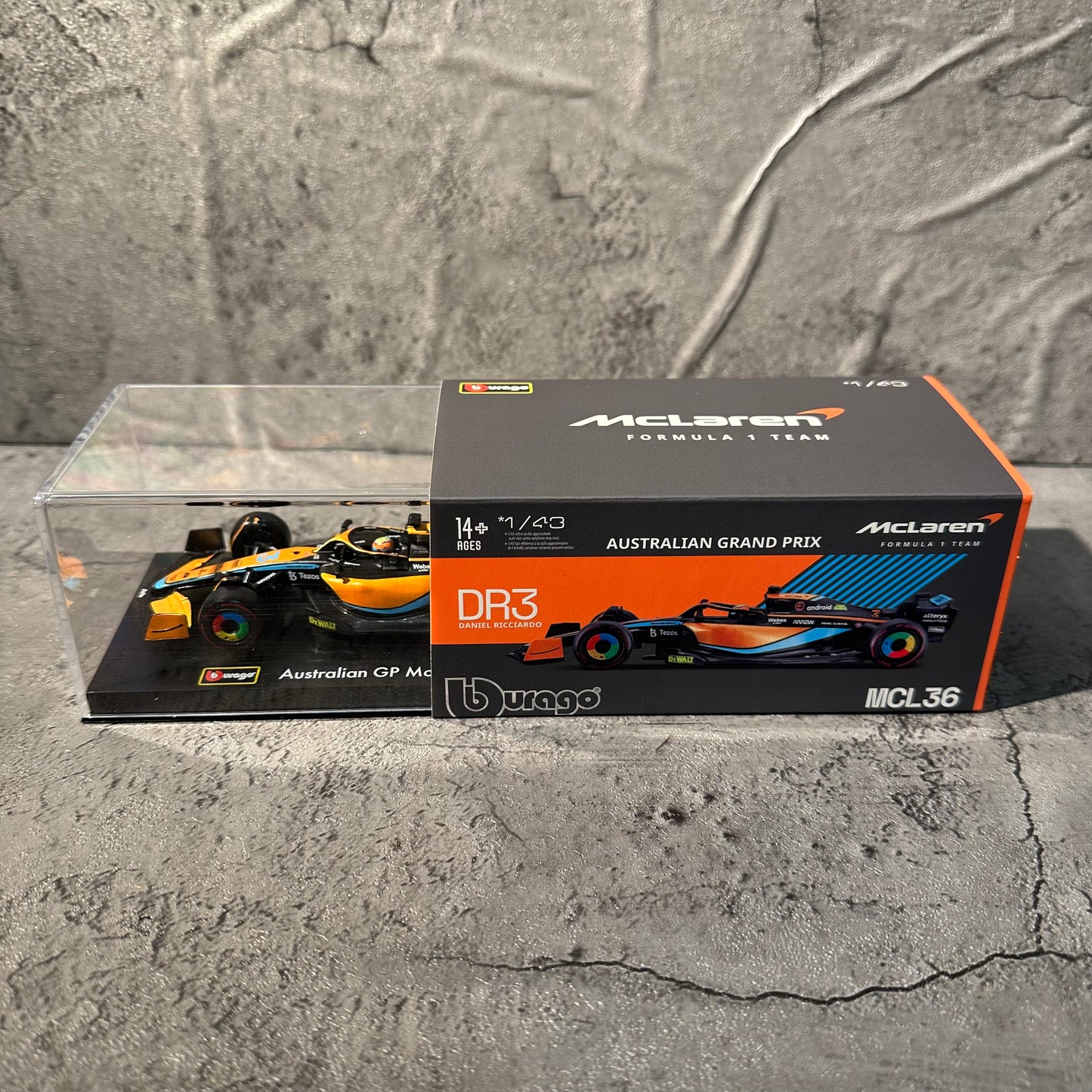 Bburago McLaren F1— MCL36 (2022) 1/43 with Driver's Helmet & Showcase