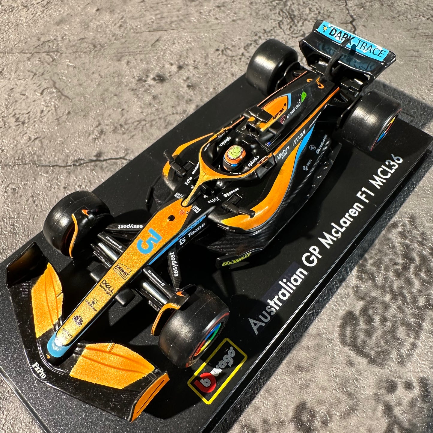 Bburago McLaren F1— MCL36 (2022) 1/43 with Driver's Helmet & Showcase