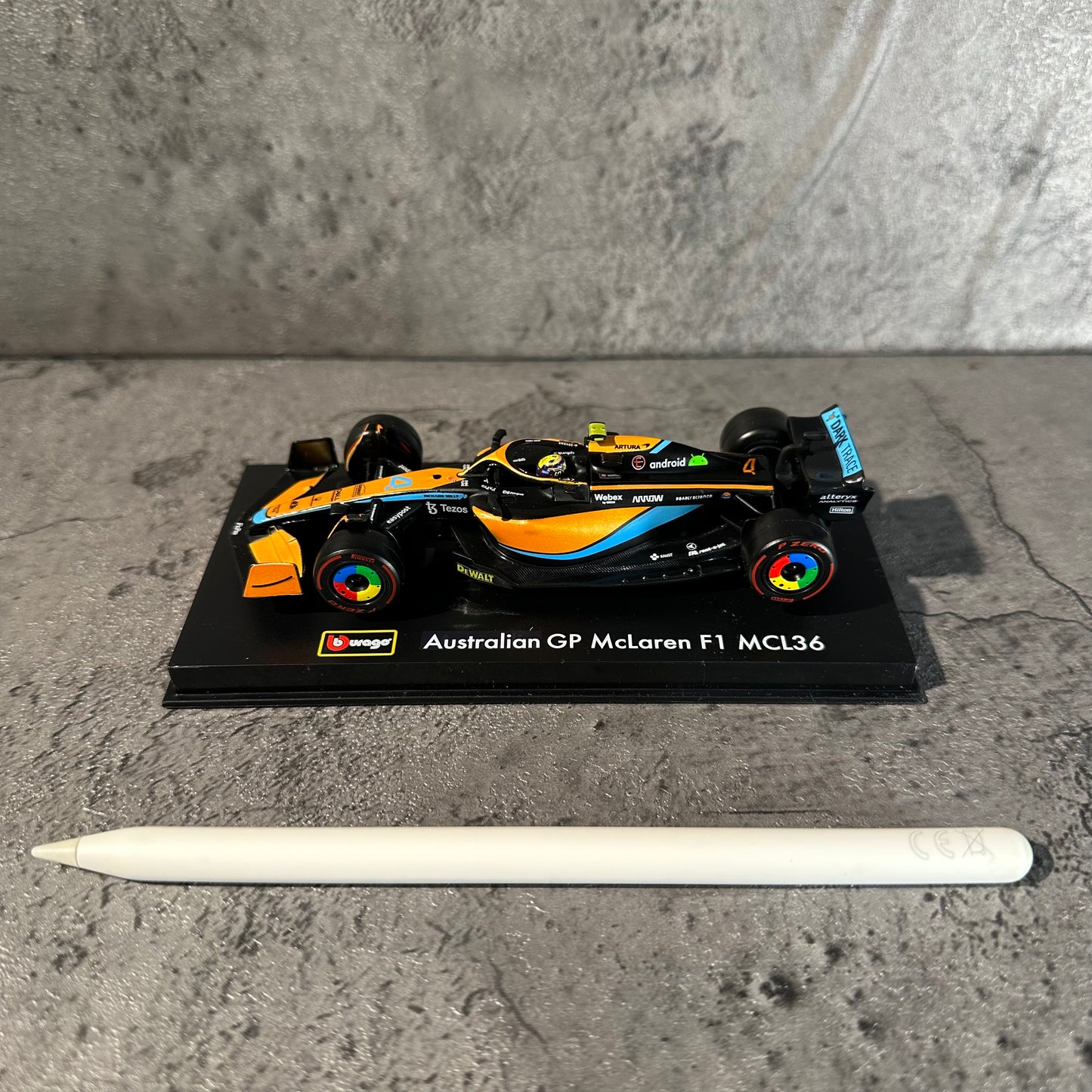 Bburago McLaren F1— MCL36 (2022) 1/43 with Driver's Helmet & Showcase