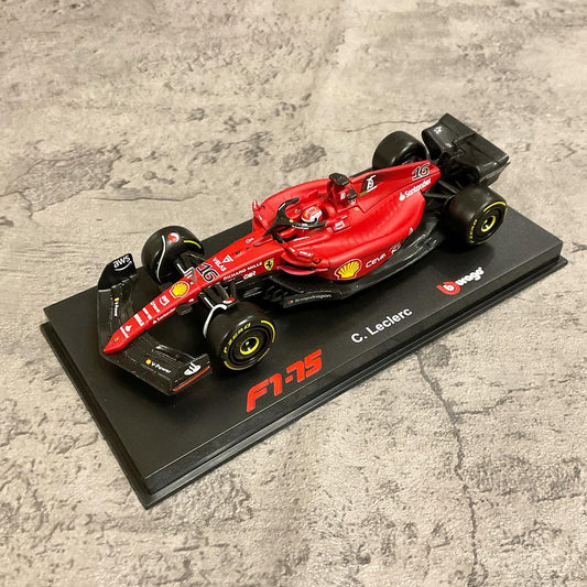 Scuderia Ferrari — F1-75 (2022) 1/43 with Driver's Helmet & Showcase