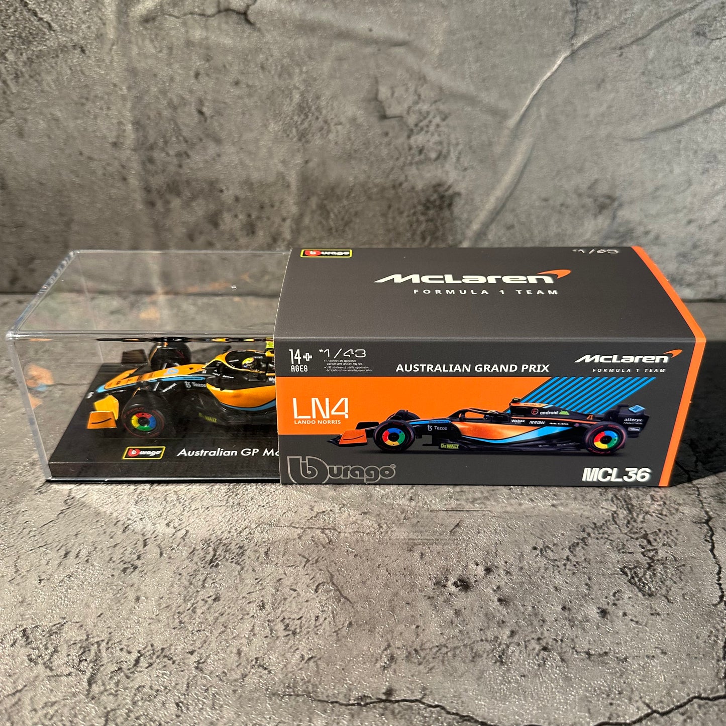 Bburago McLaren F1— MCL36 (2022) 1/43 with Driver's Helmet & Showcase
