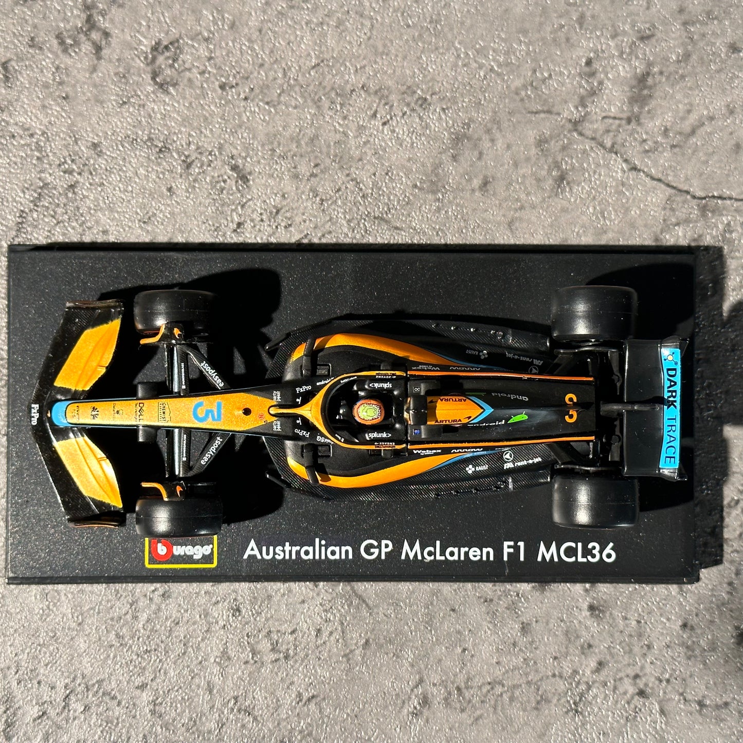 Bburago McLaren F1— MCL36 (2022) 1/43 with Driver's Helmet & Showcase