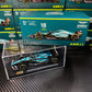 [IN STOCK] Bburago Aston Martin F1 AMR23 (2023) with Driver's Helmet & Showcase 1:43