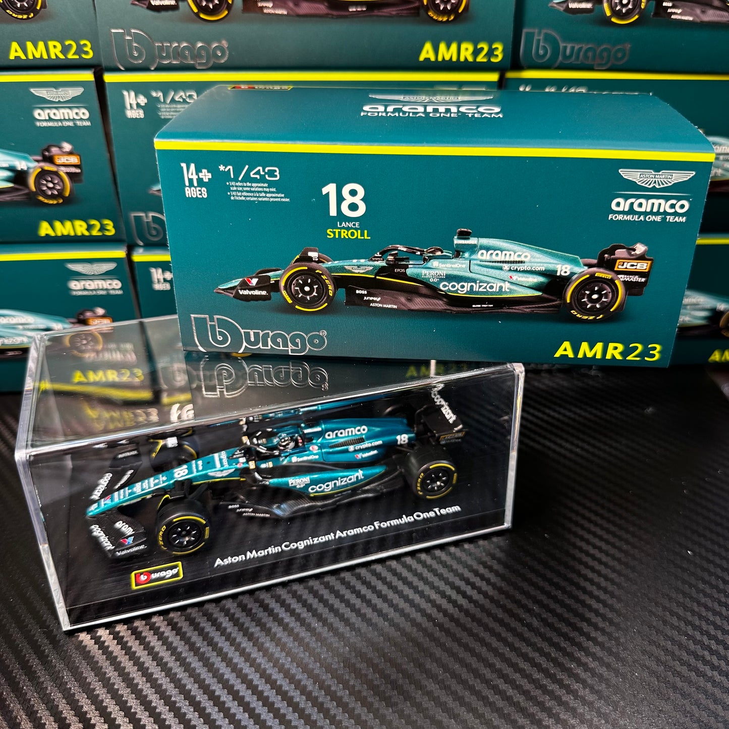 [IN STOCK] Bburago Aston Martin F1 AMR23 (2023) with Driver's Helmet & Showcase 1:43