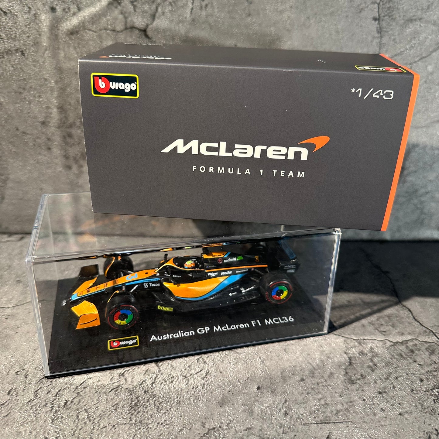 Bburago McLaren F1— MCL36 (2022) 1/43 with Driver's Helmet & Showcase