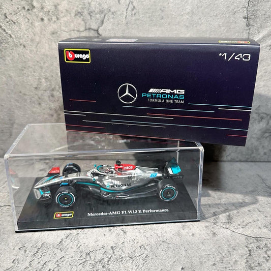 Mercedes-AMG W13E Performance (2022) 1:43 with Driver’s Helmet & Showcase