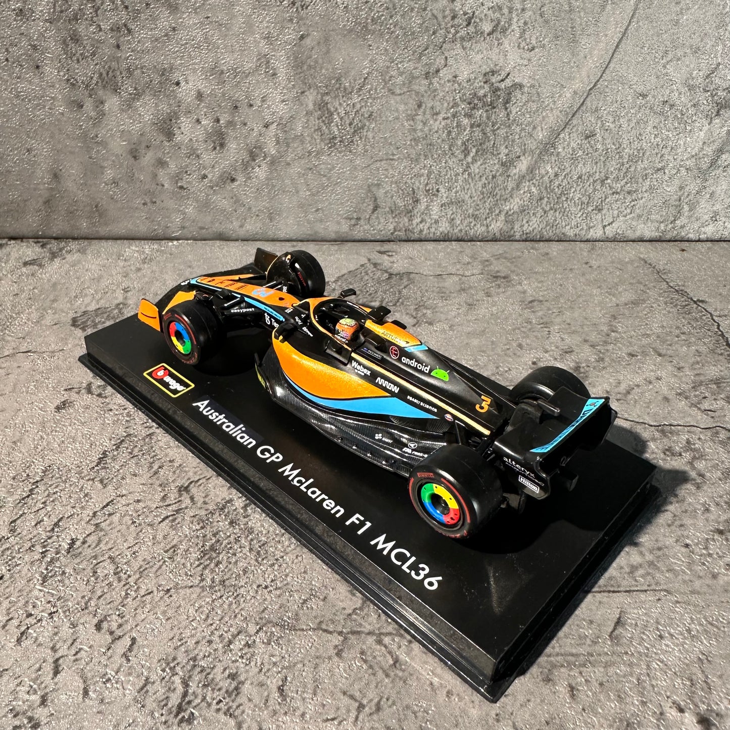 Bburago McLaren F1— MCL36 (2022) 1/43 with Driver's Helmet & Showcase